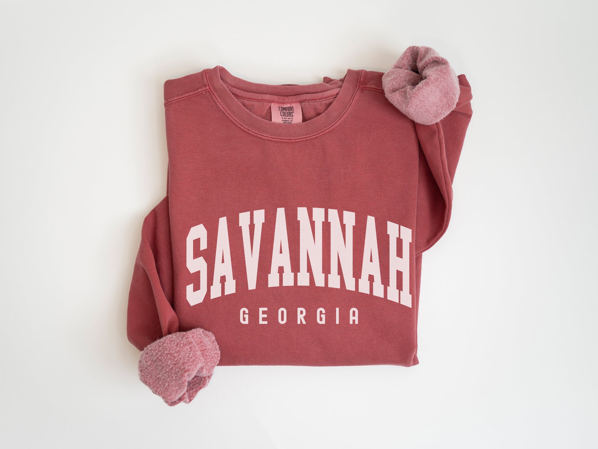 a red sweatshirt with the word savannah on it