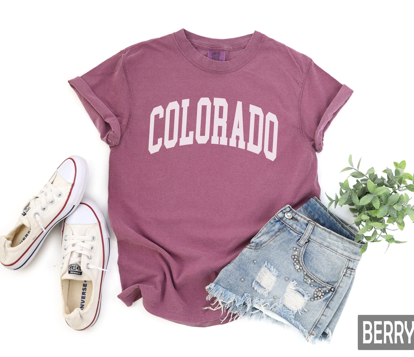 a maroon shirt with the word colorado printed on it