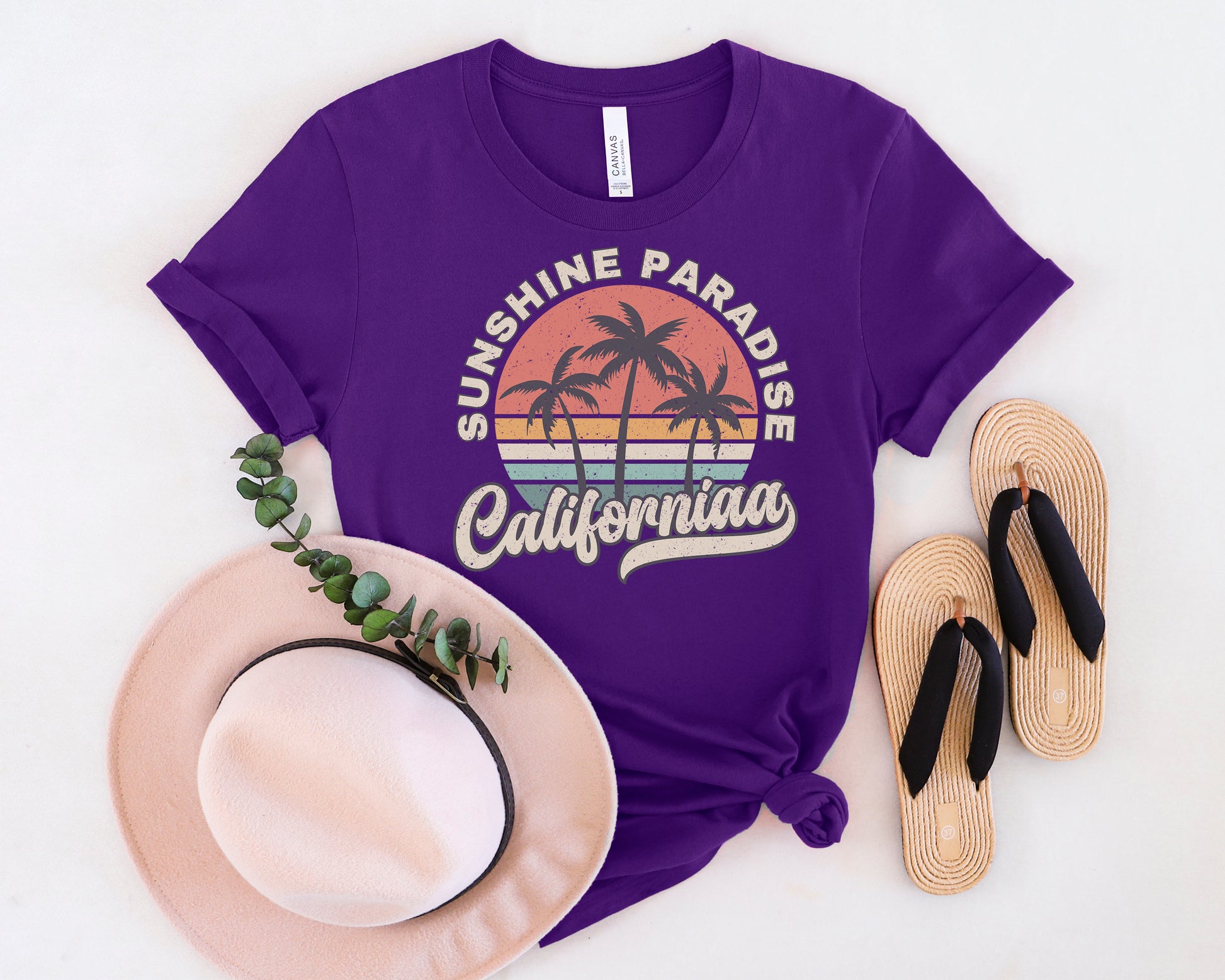 a purple shirt with the words sunshine paradise california on it