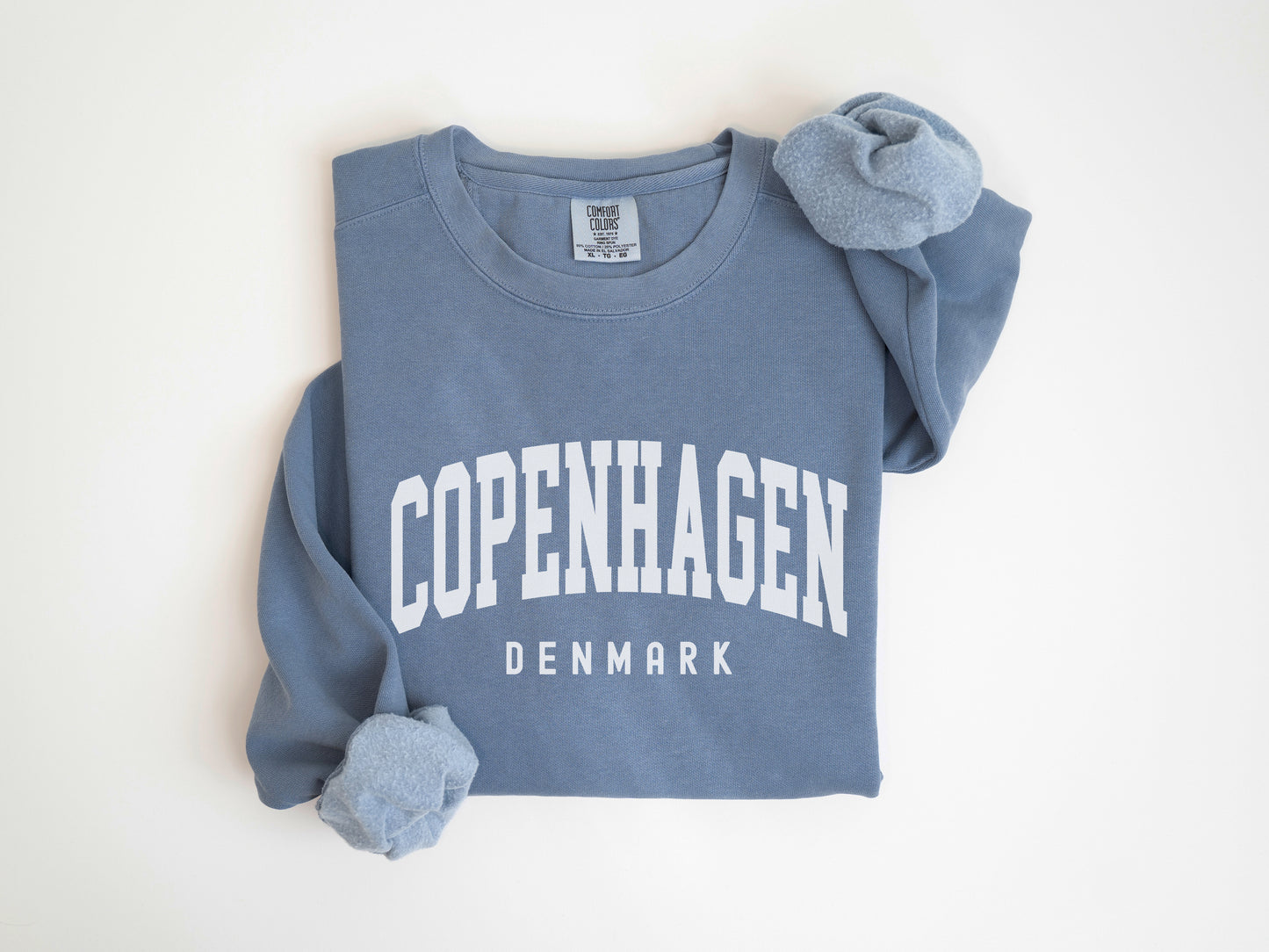 a blue sweatshirt with the words copenhagen on it