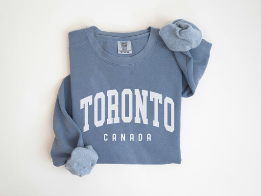 a blue shirt with the word toronto on it