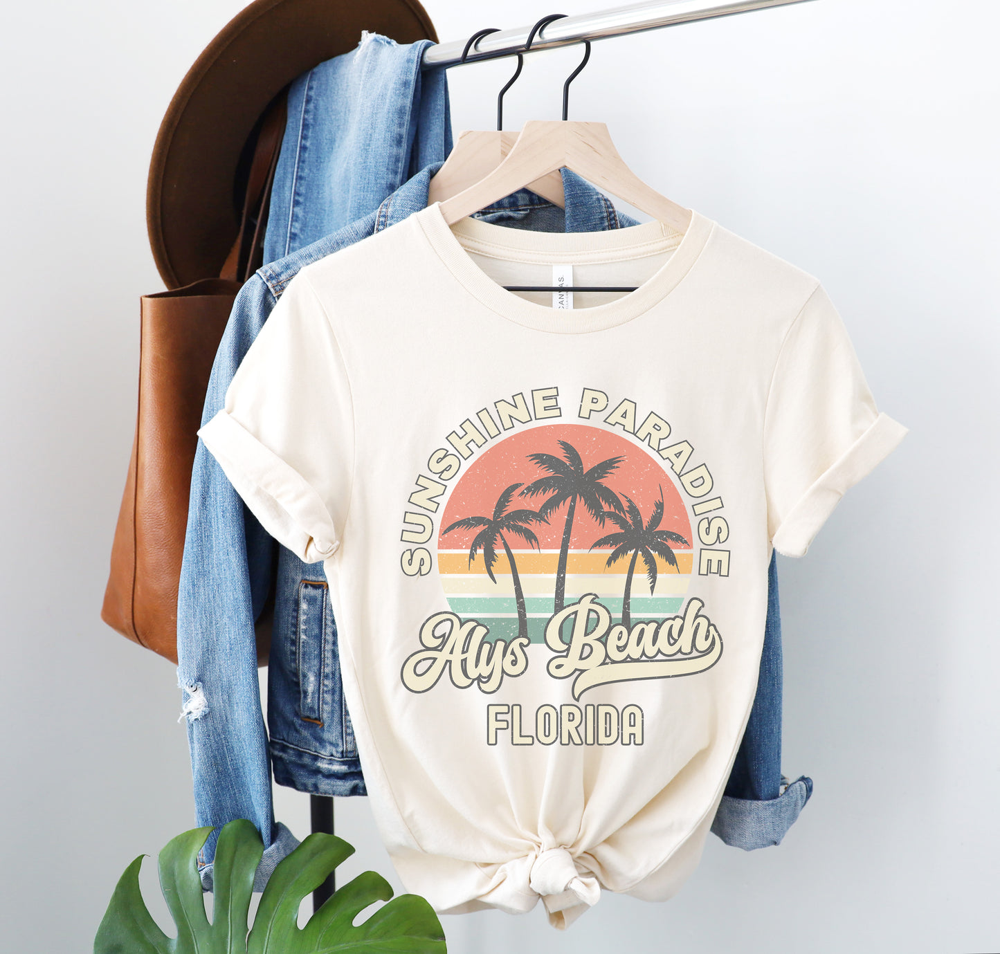 a white t - shirt with a palm tree on it