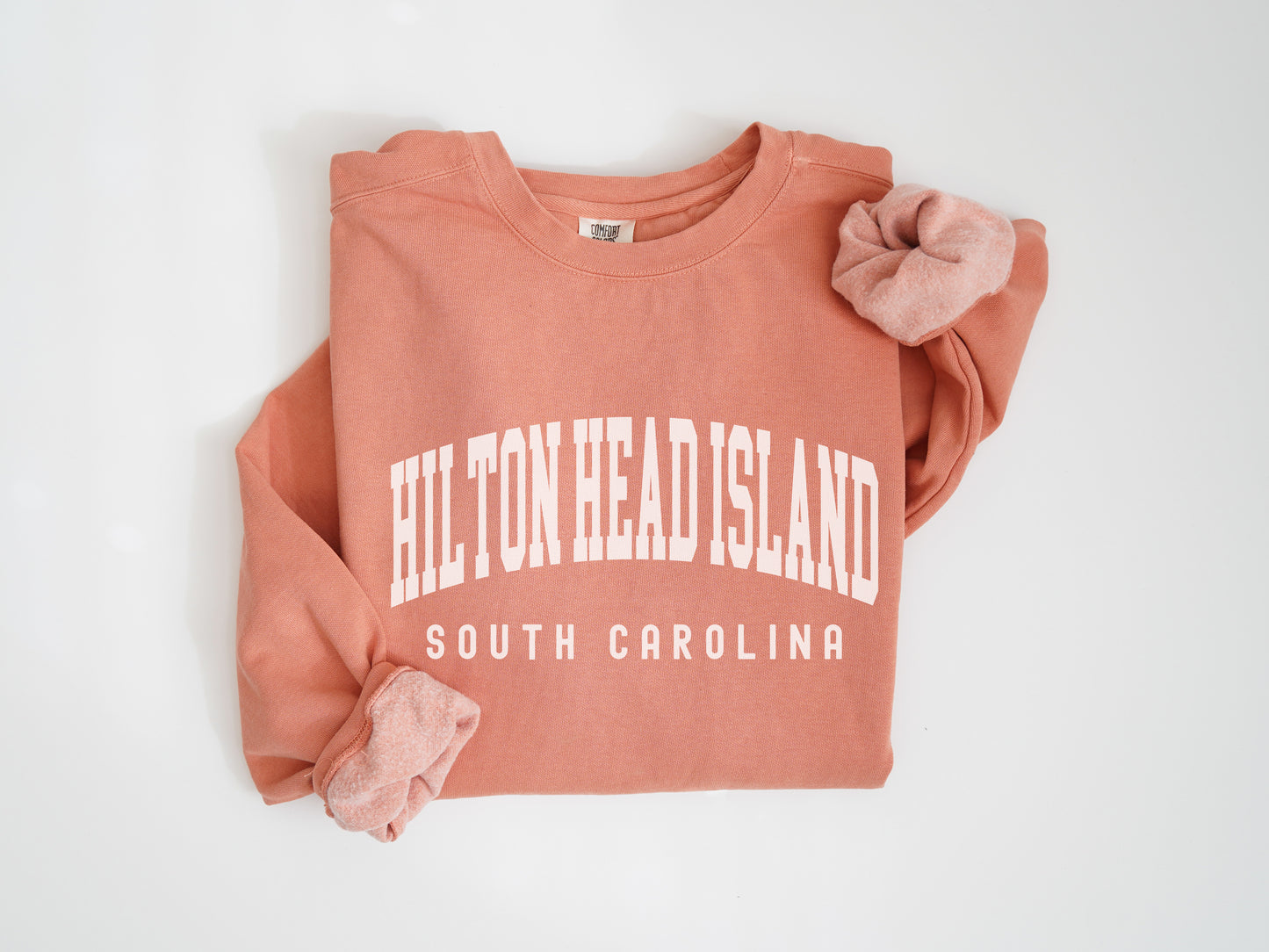 a pink sweatshirt with the words hitton head island on it