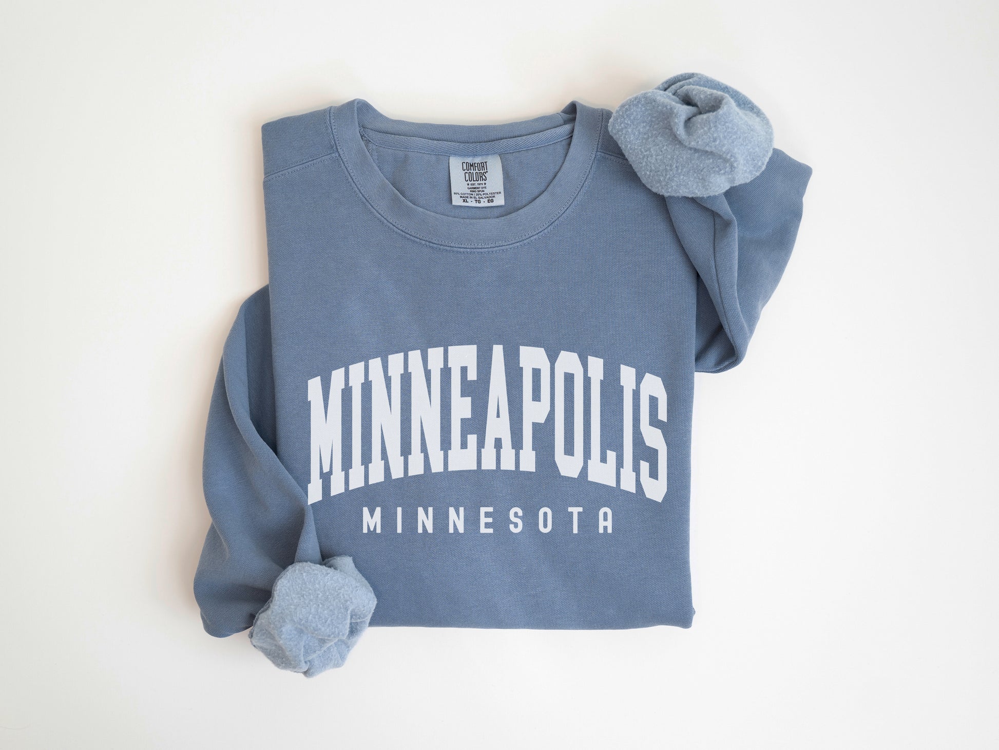 a blue shirt with minnesota on the front and minnesota on the back