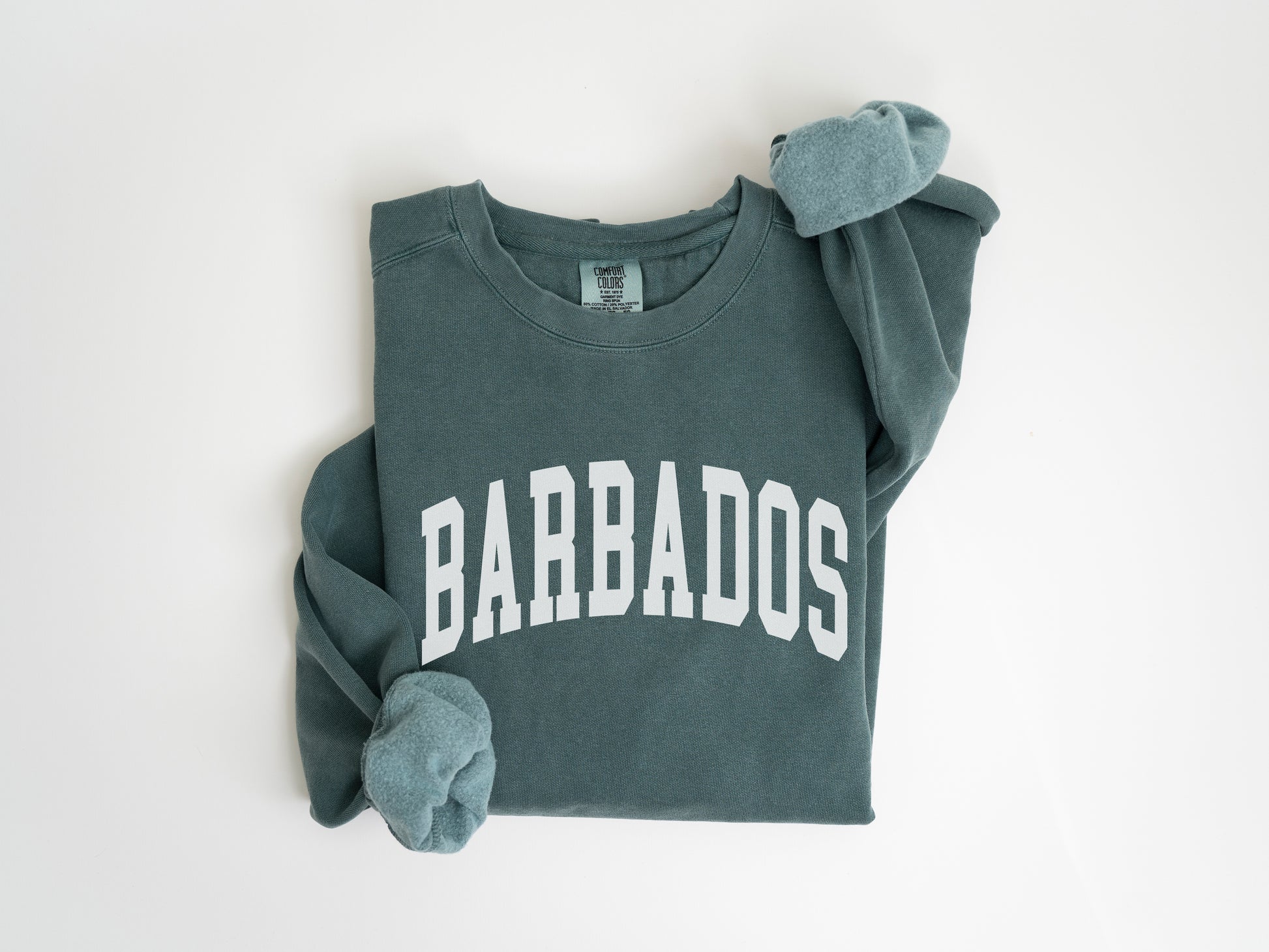 a green sweatshirt with the word barbados on it