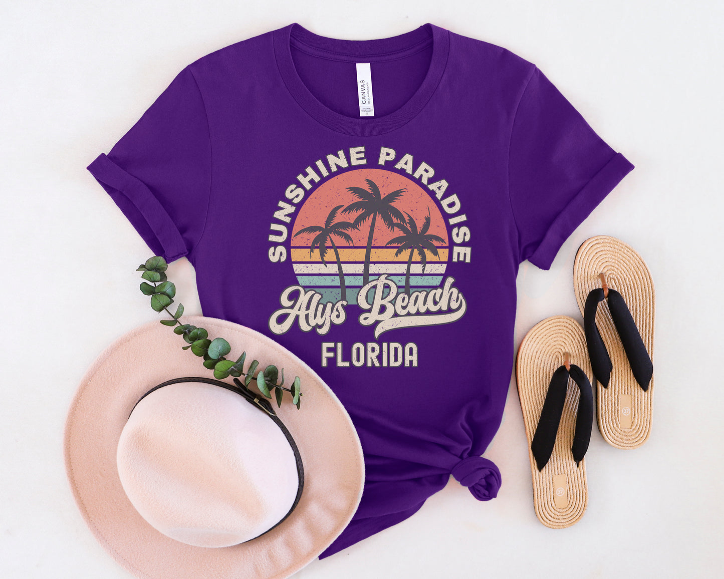 a purple shirt that says sunshine paradise with a palm tree on it