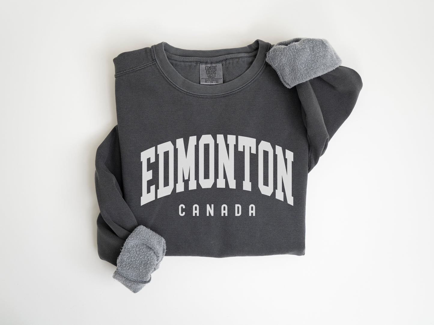 a gray shirt with the word edmonton on it