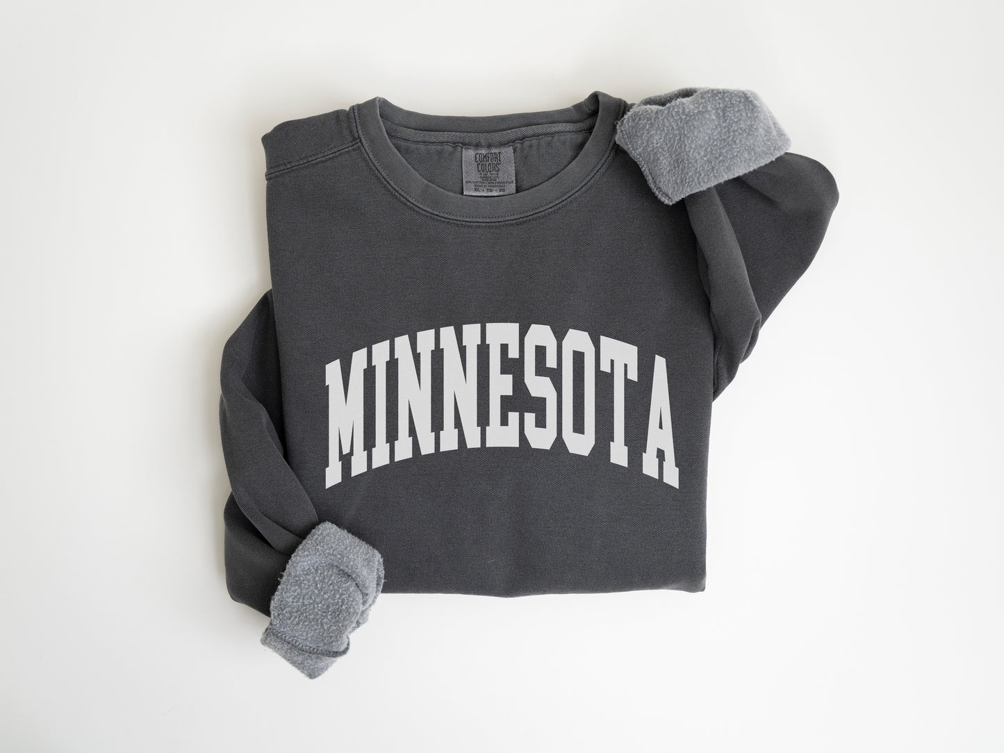 a sweatshirt with the word minnesota printed on it