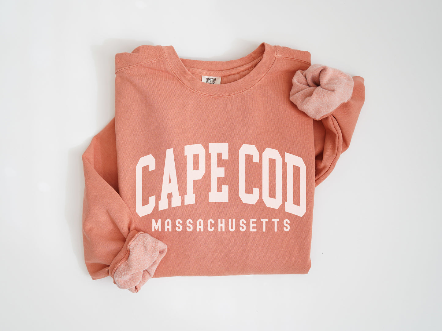 a pink sweatshirt with the words cape co on it