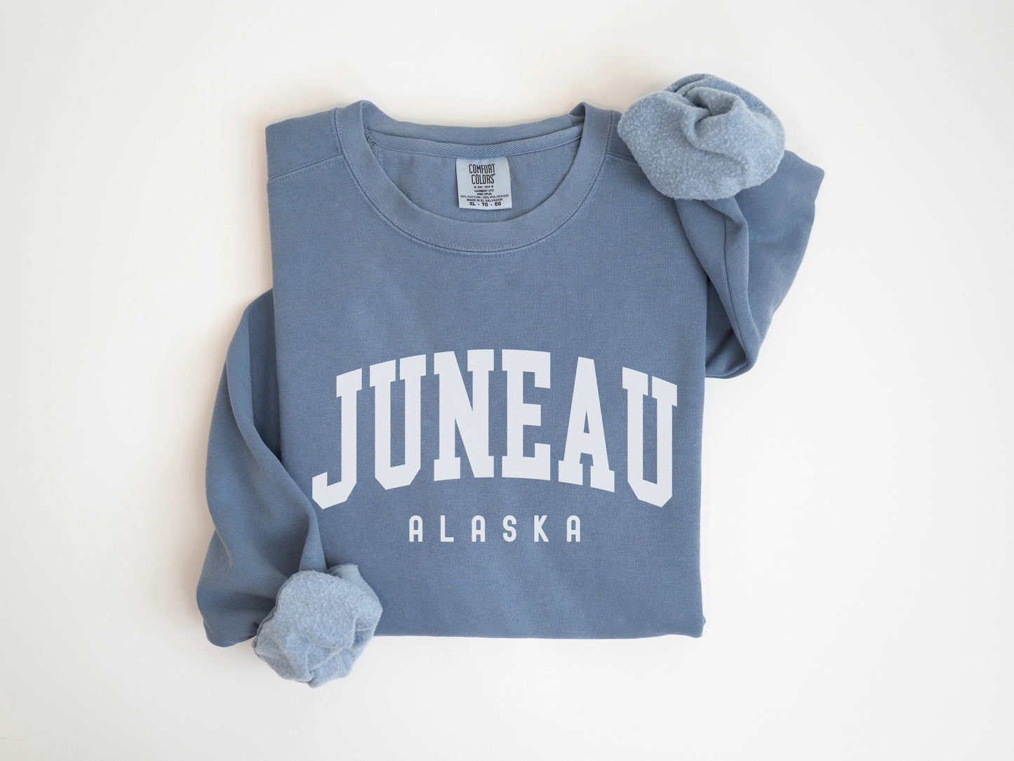 a blue shirt with the word juneau on it