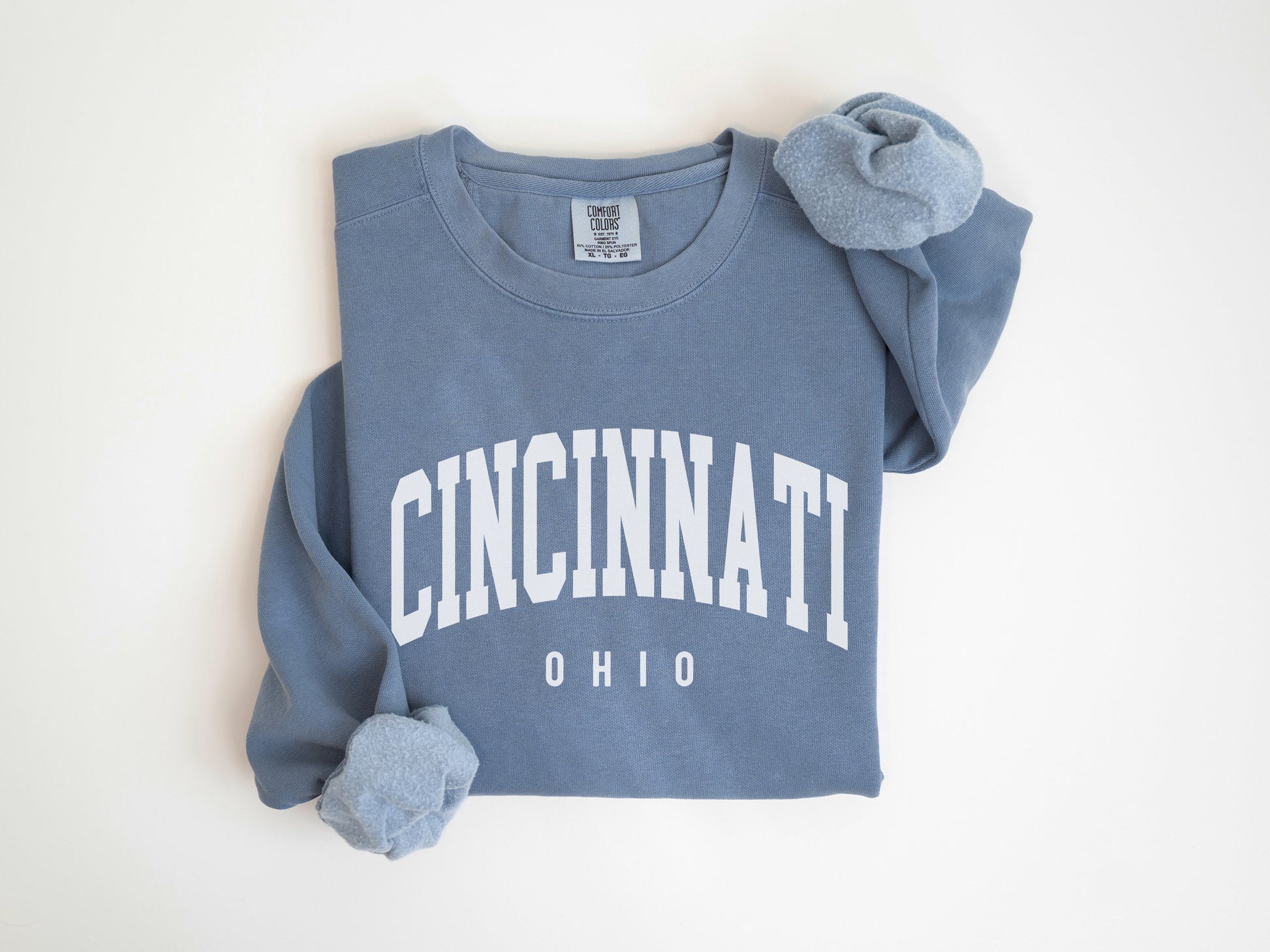 a blue sweatshirt with the word cincinnati on it