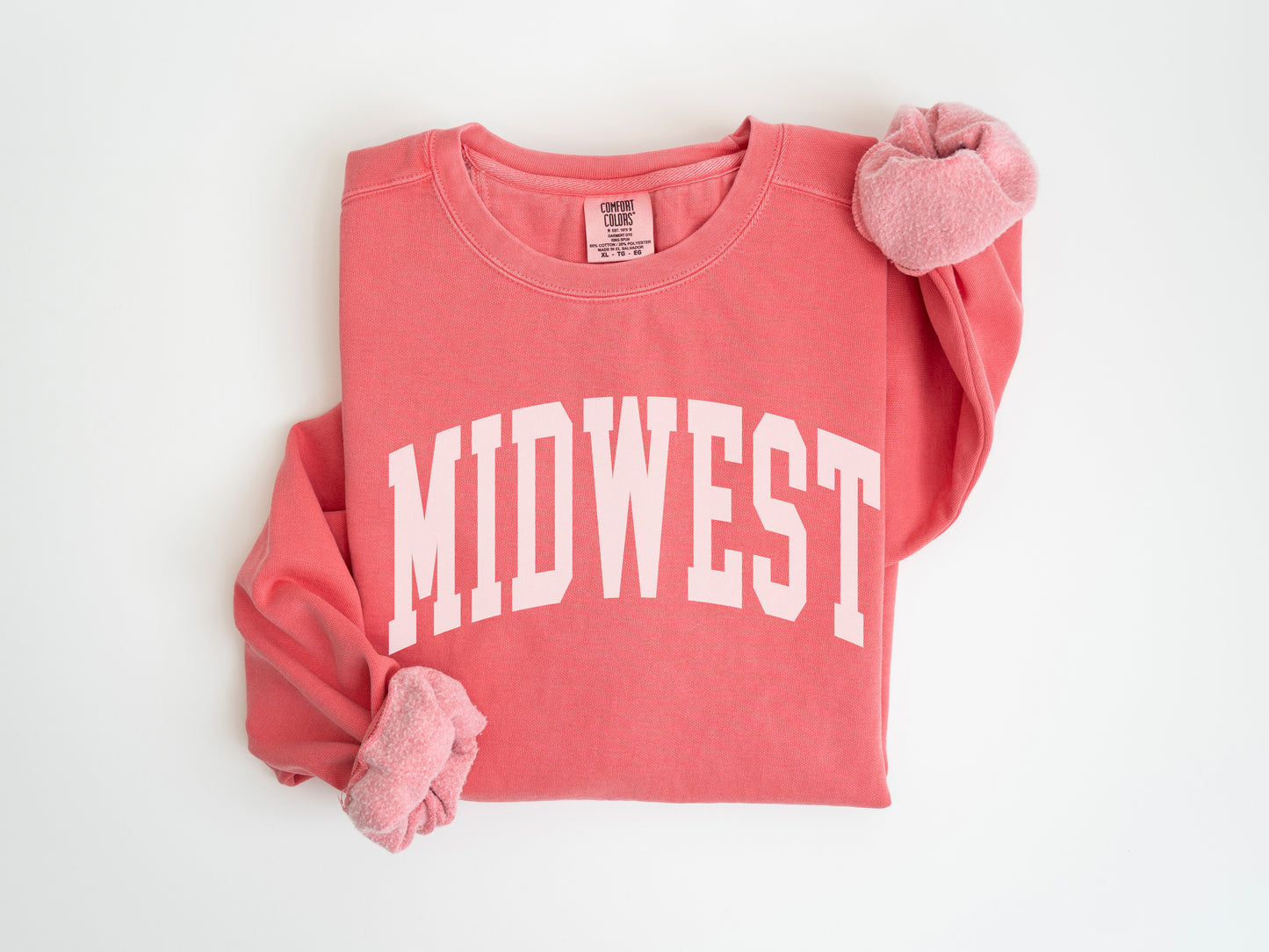 a red sweatshirt with the word midwest on it