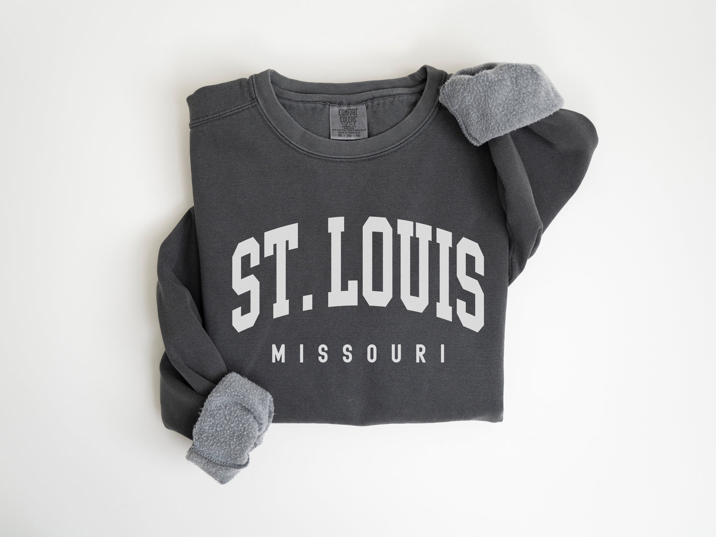 a st louis sweatshirt is shown on a white background