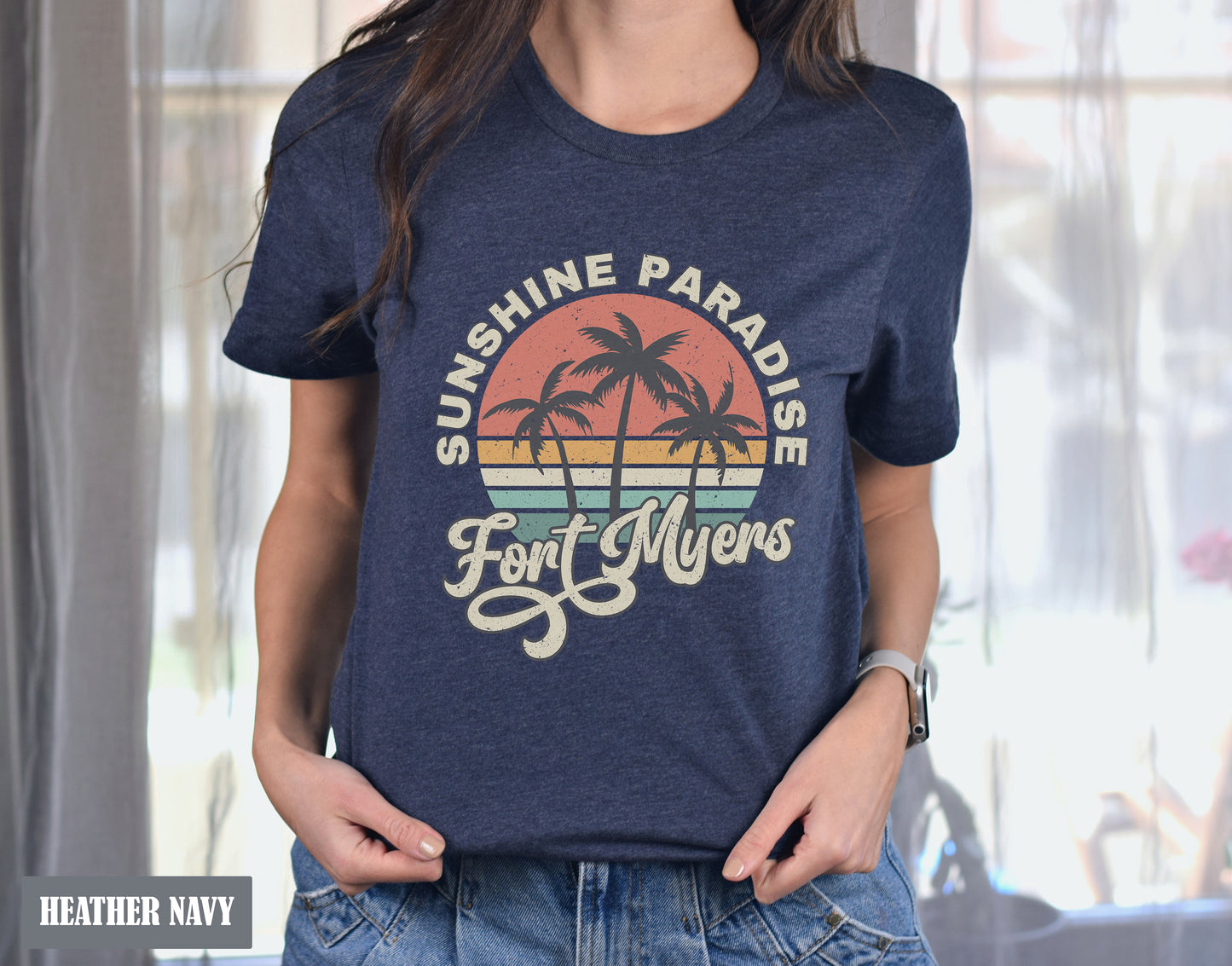 a woman wearing a blue shirt that says sunshine paradise for muens