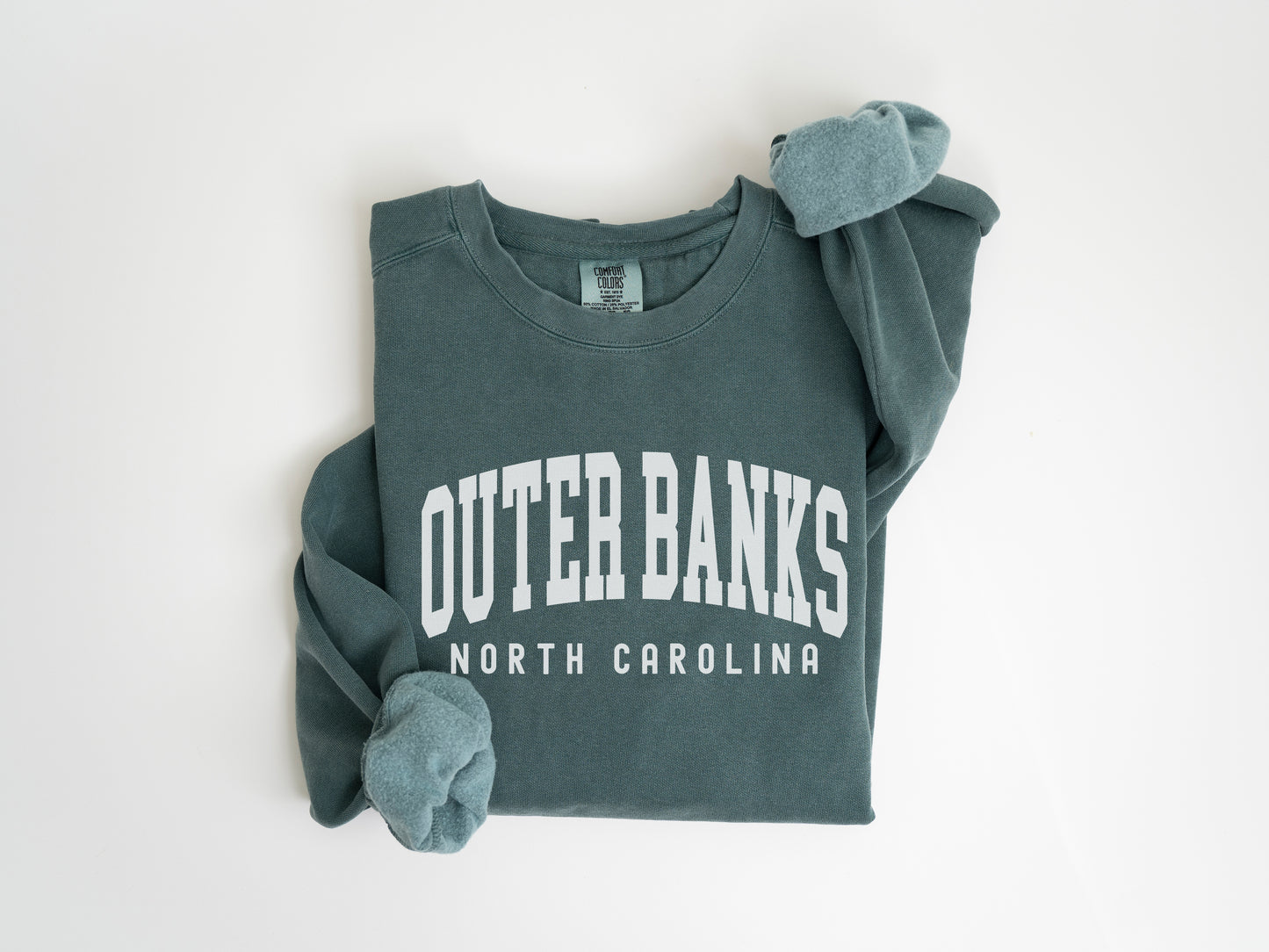 a t - shirt with the words outer banks on it