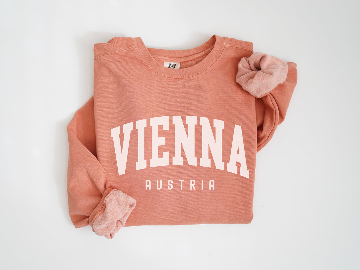 a pink sweatshirt with the word vienna on it