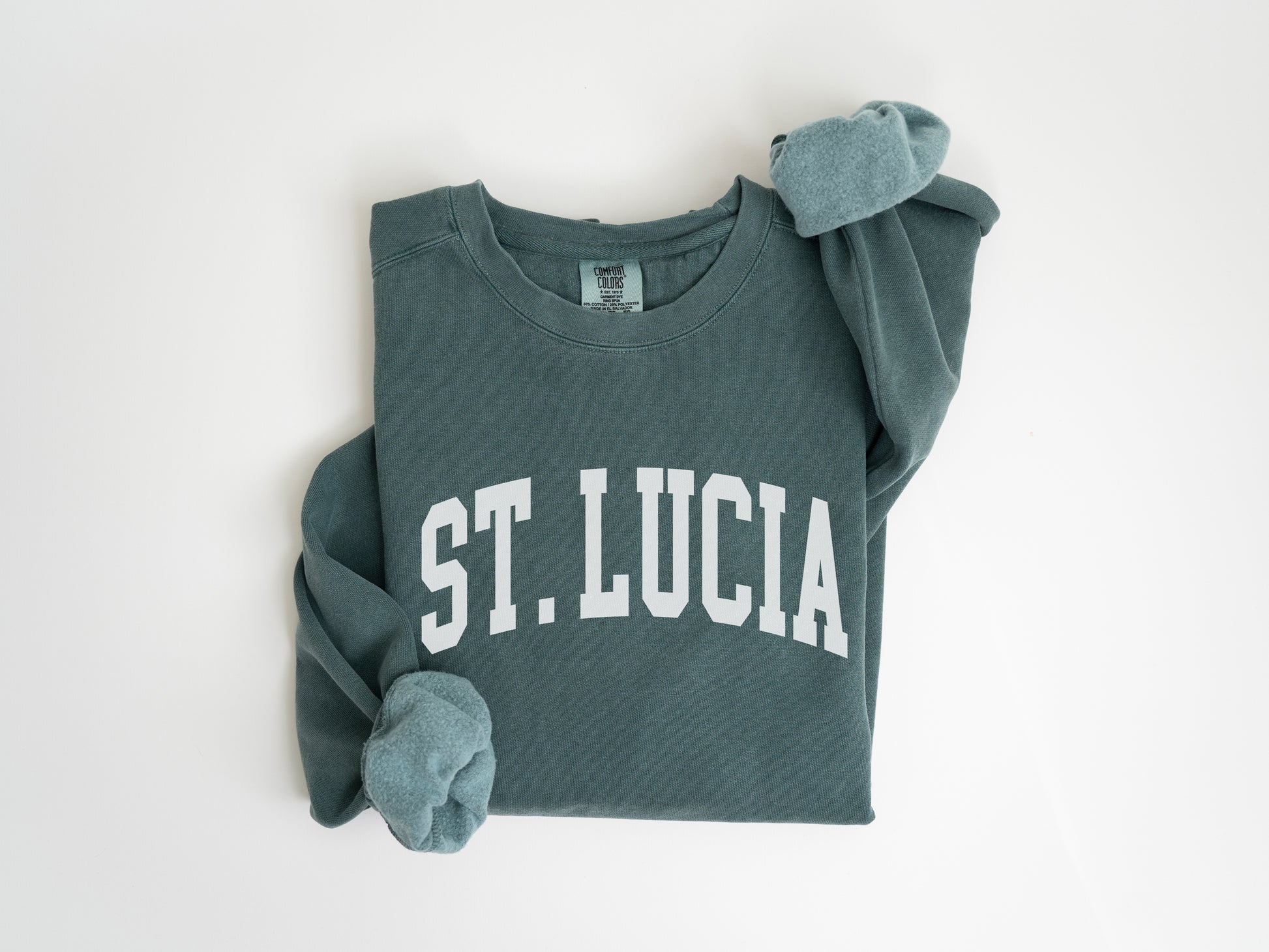 a green sweatshirt with the word st lucia on it