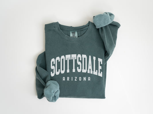 a green sweatshirt with the word scottsdale on it