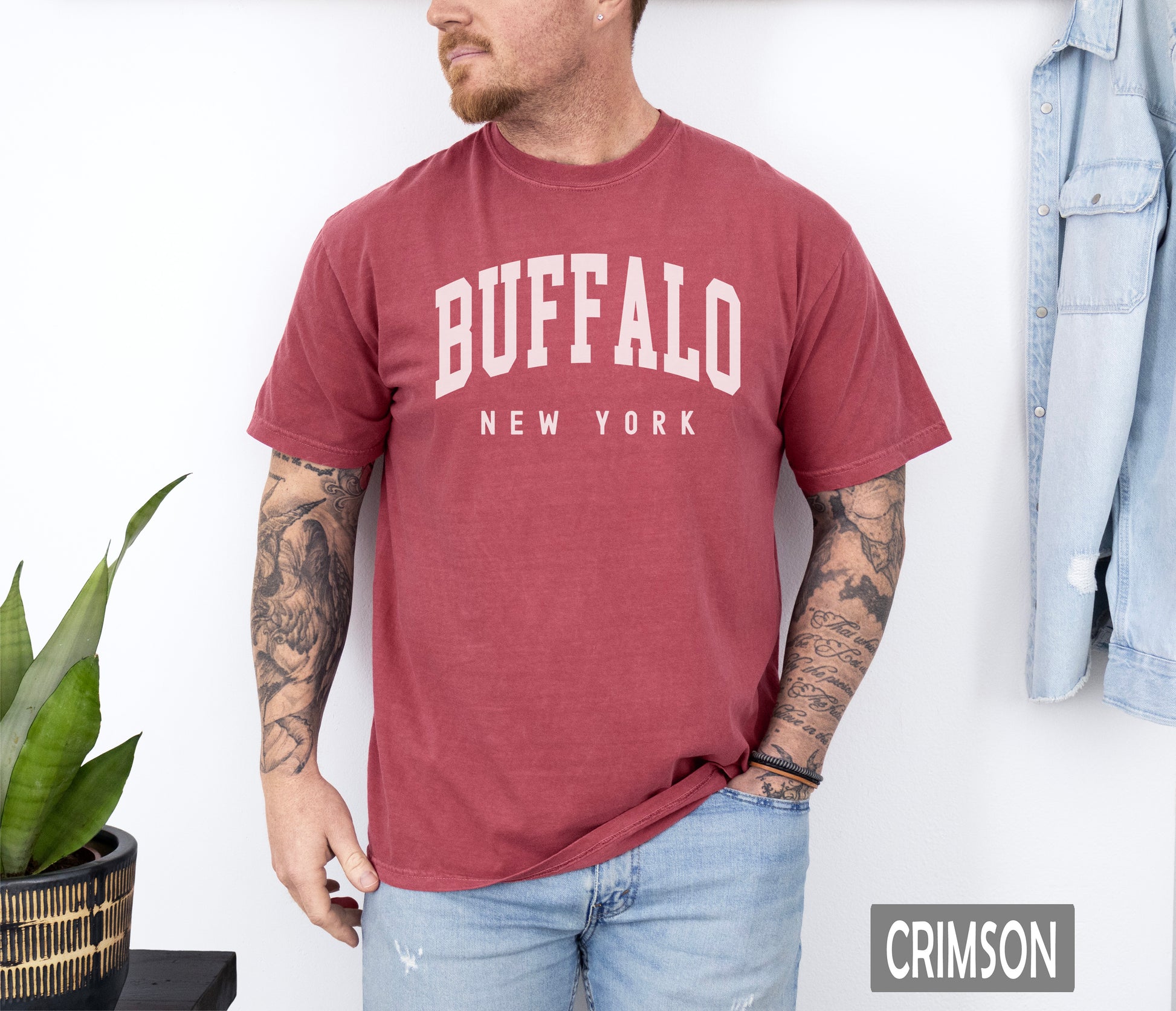 a man wearing a buffalo new york t - shirt