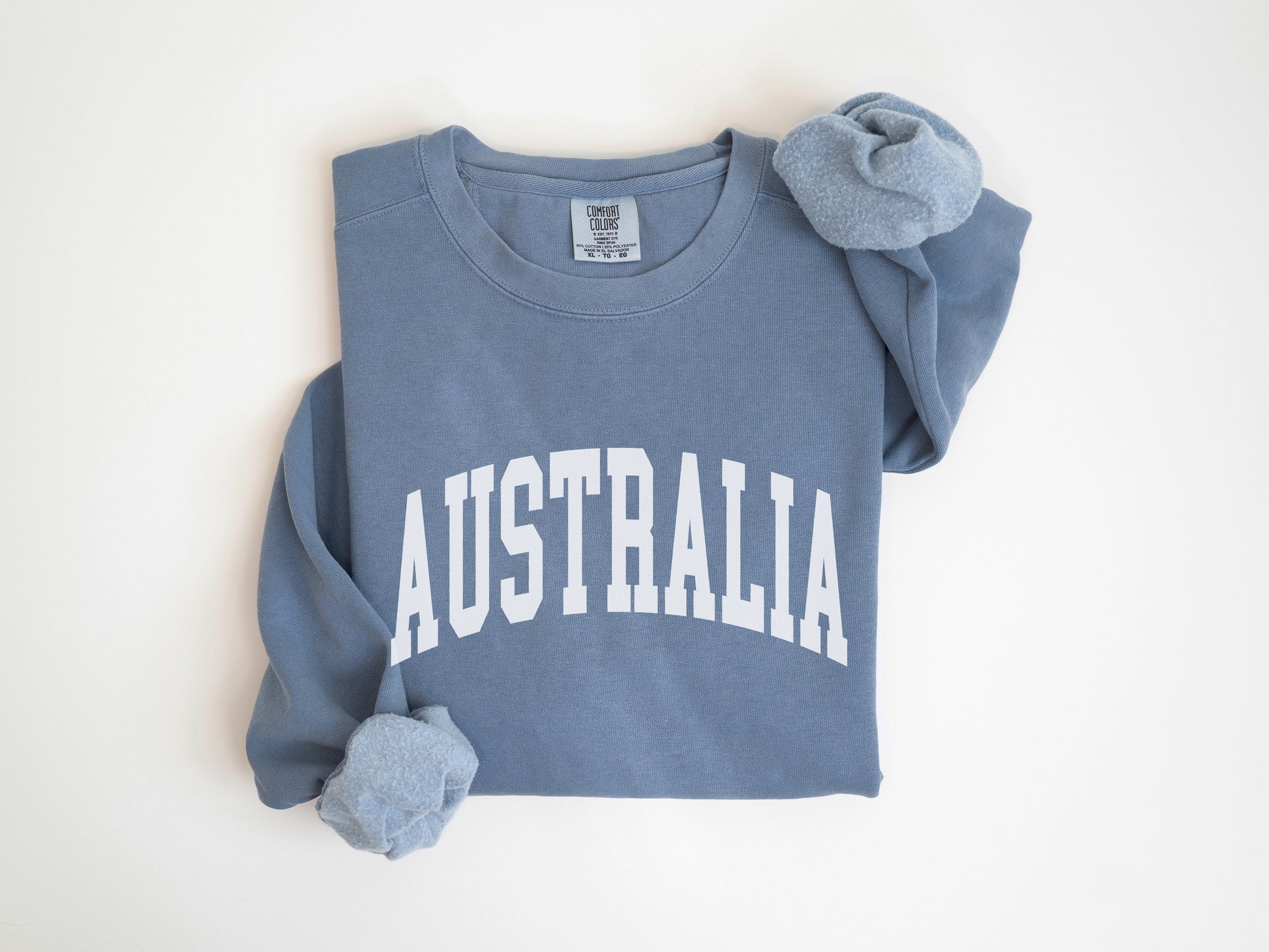 a blue sweatshirt with the word australia printed on it