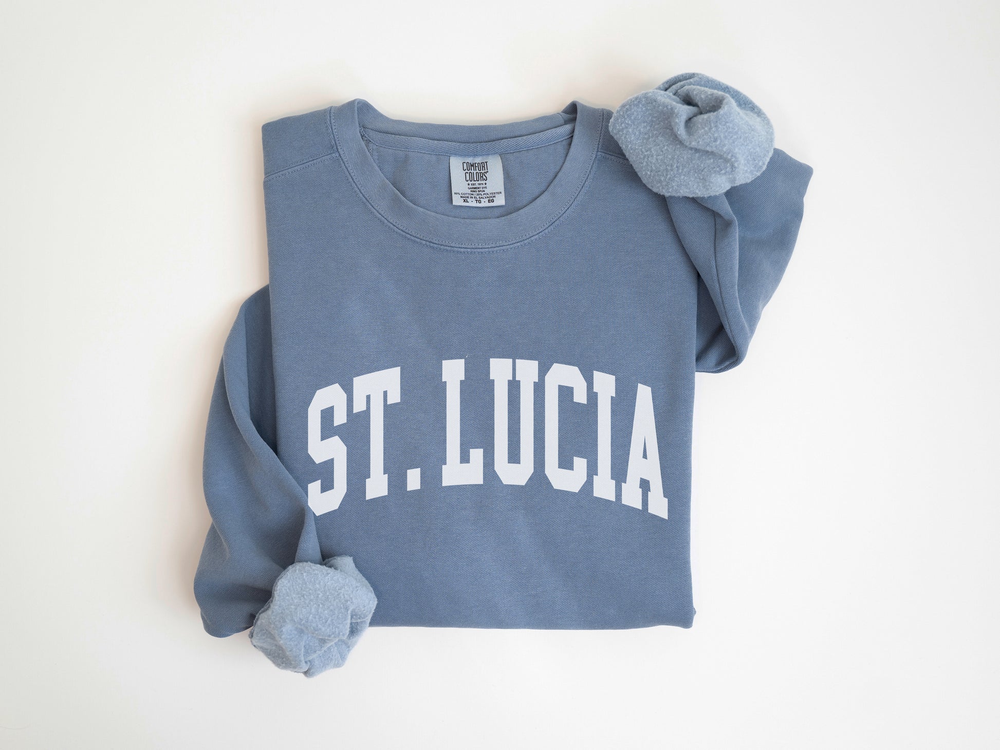 a blue sweatshirt with the word st lucia on it