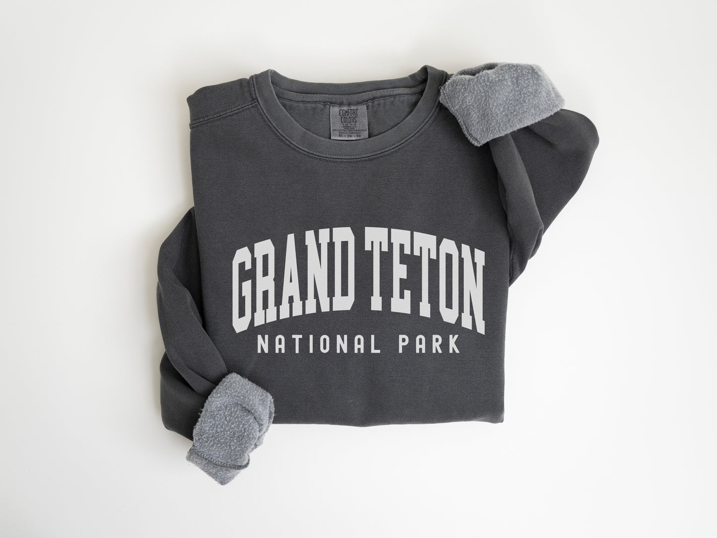 a gray shirt with the words grand teton on it