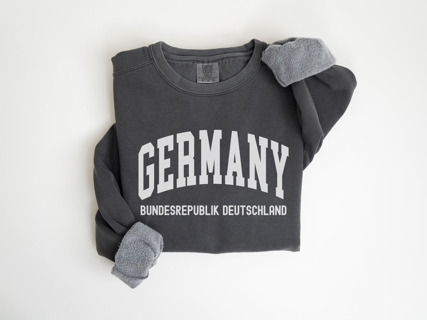 a black shirt with german writing on it