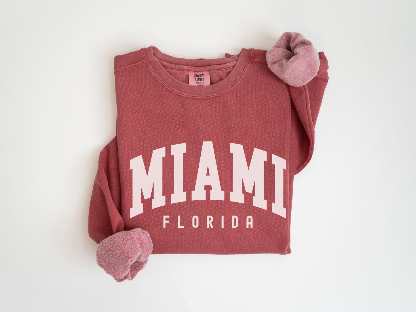 a red shirt with the word miami on it