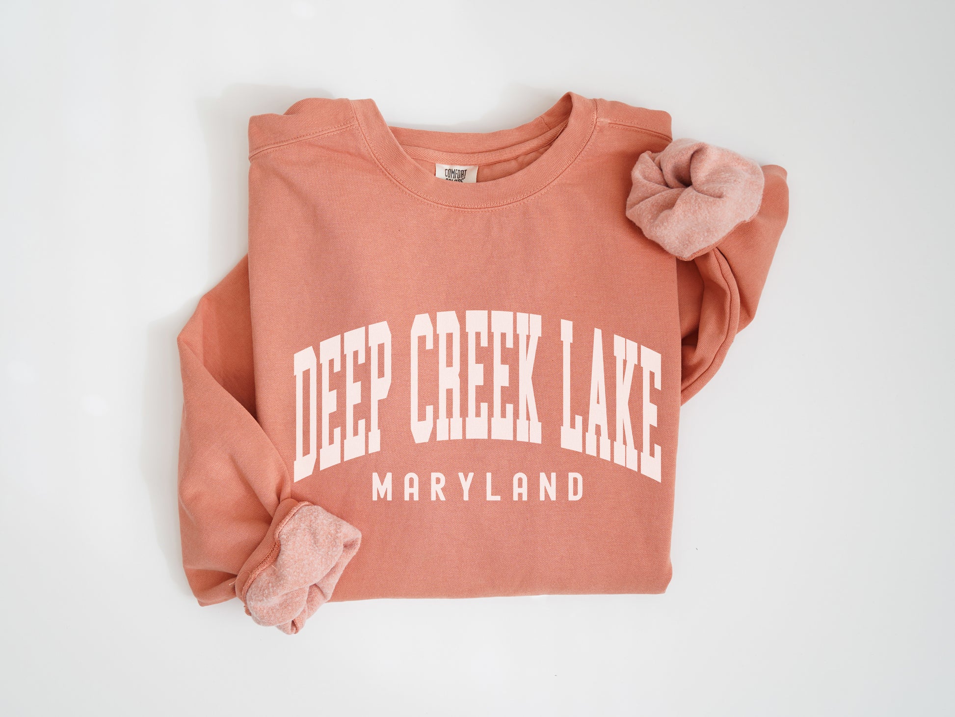 a red sweatshirt with the words deep creek lake on it