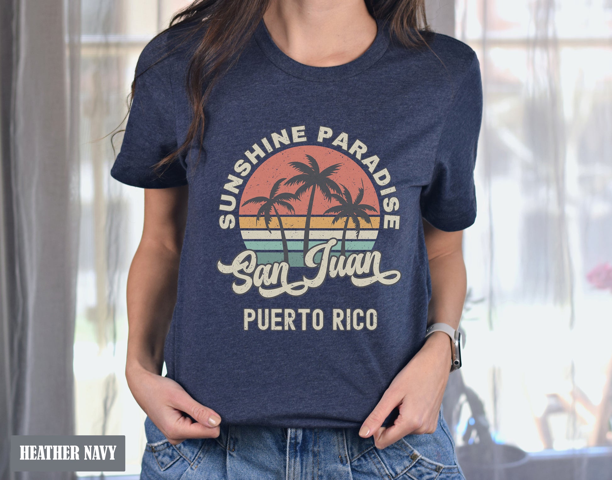 a woman wearing a blue shirt that says sunshine paradise san juan puerto rico