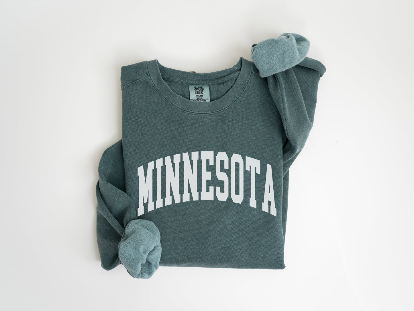 a sweatshirt with the word minnesota printed on it