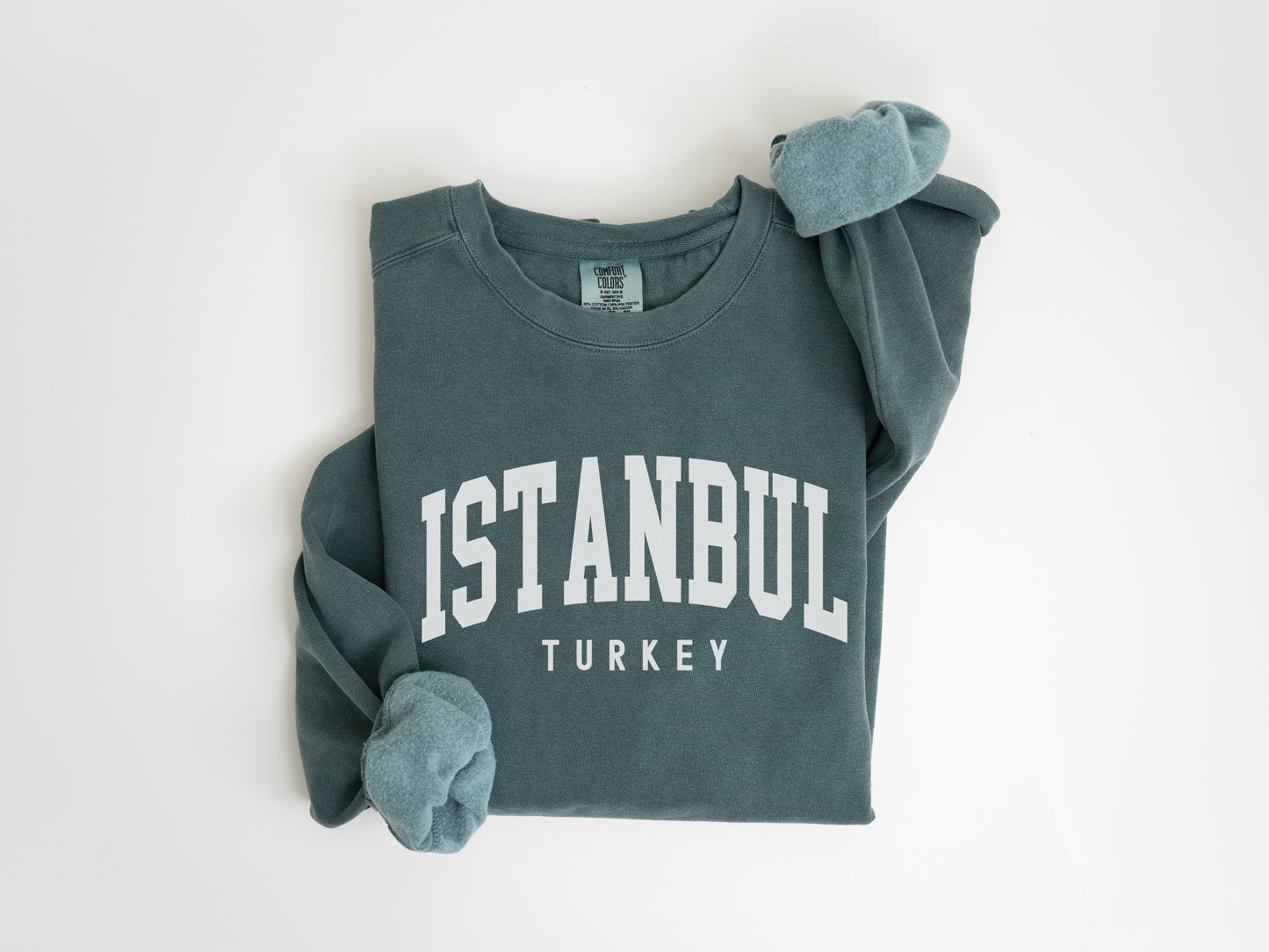 a green sweatshirt with the word stanbul on it